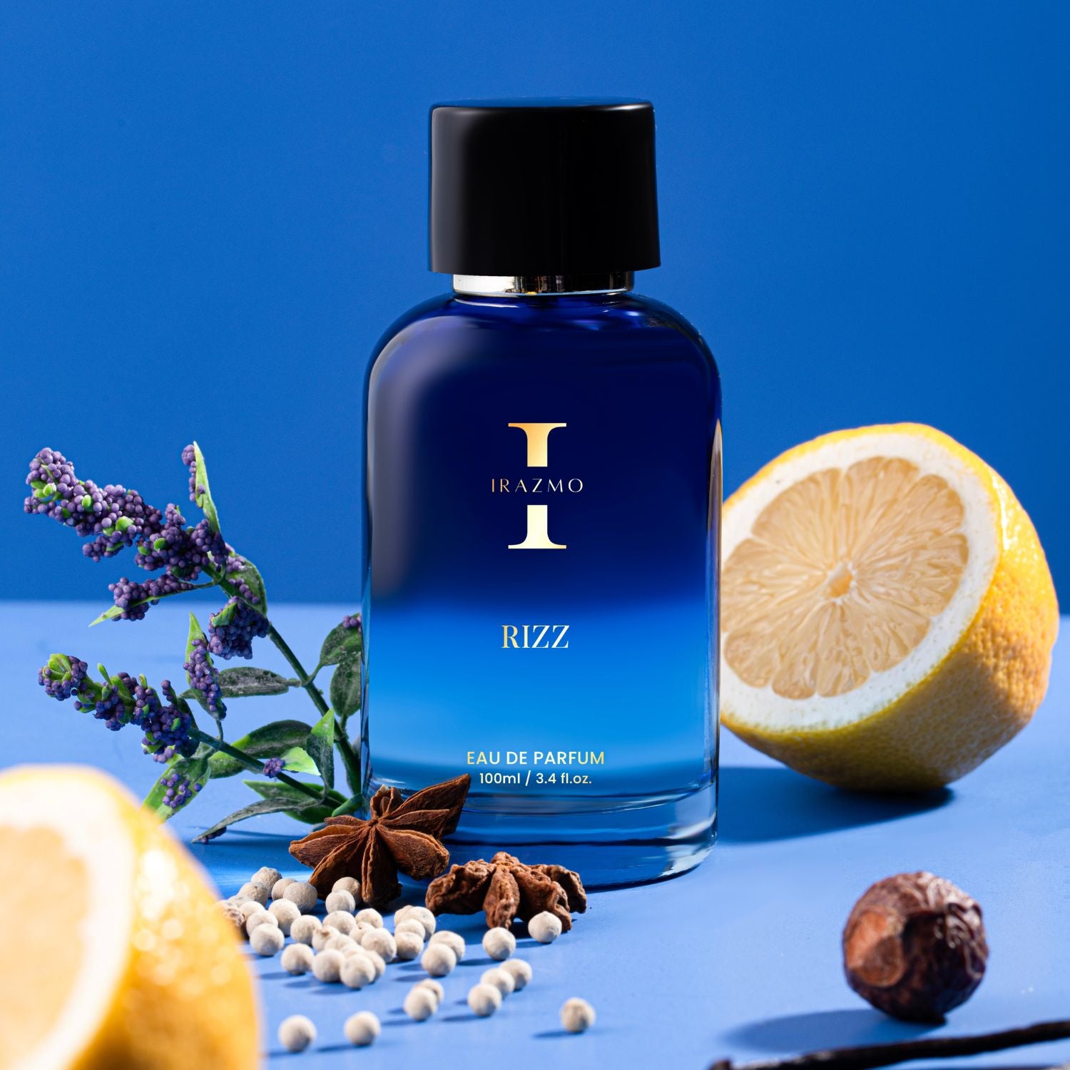 Blue perfume bottle labeled 'Rizz' with lemons, lavender, and spices on a blue background