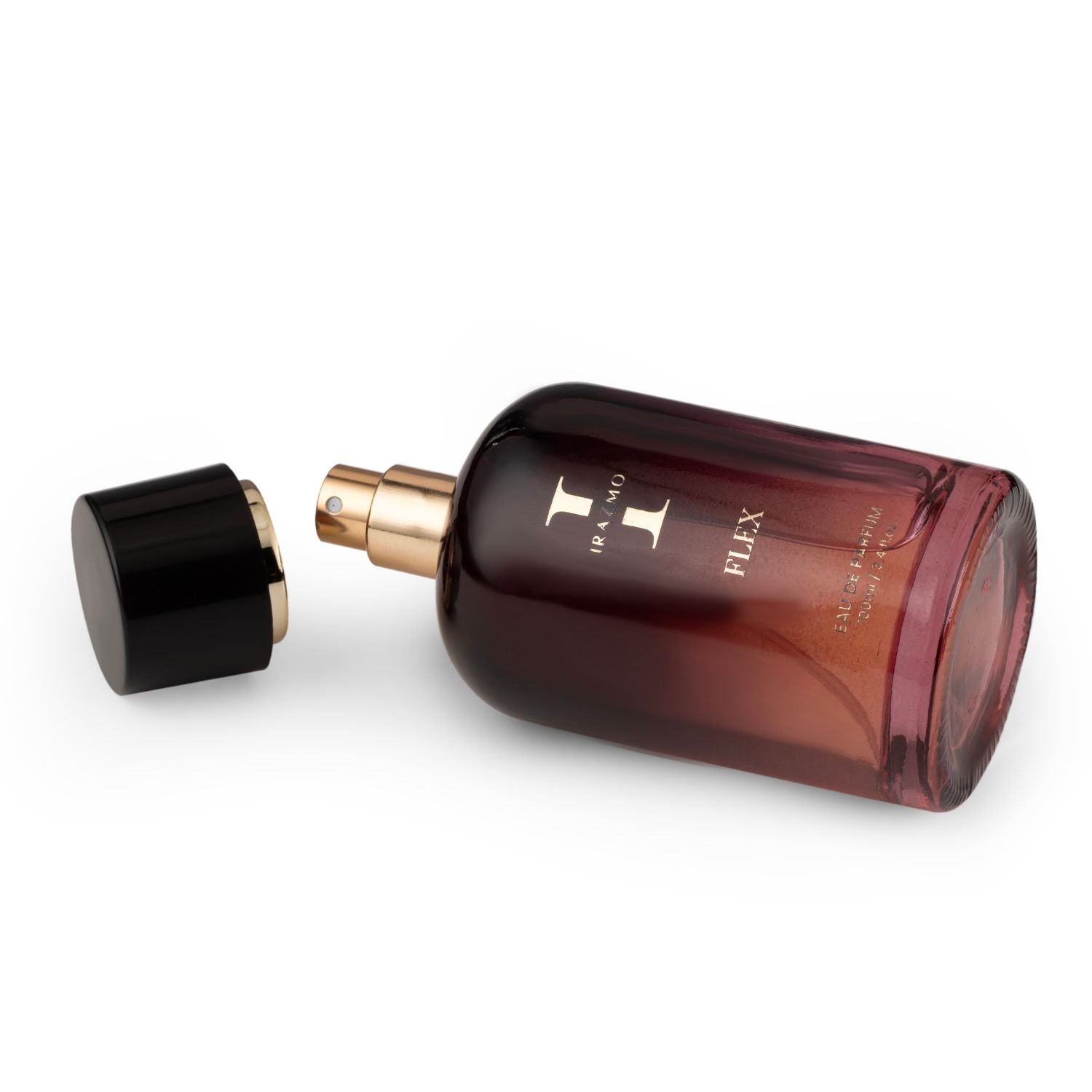 Perfume bottle with black cap and gold nozzle on a white background