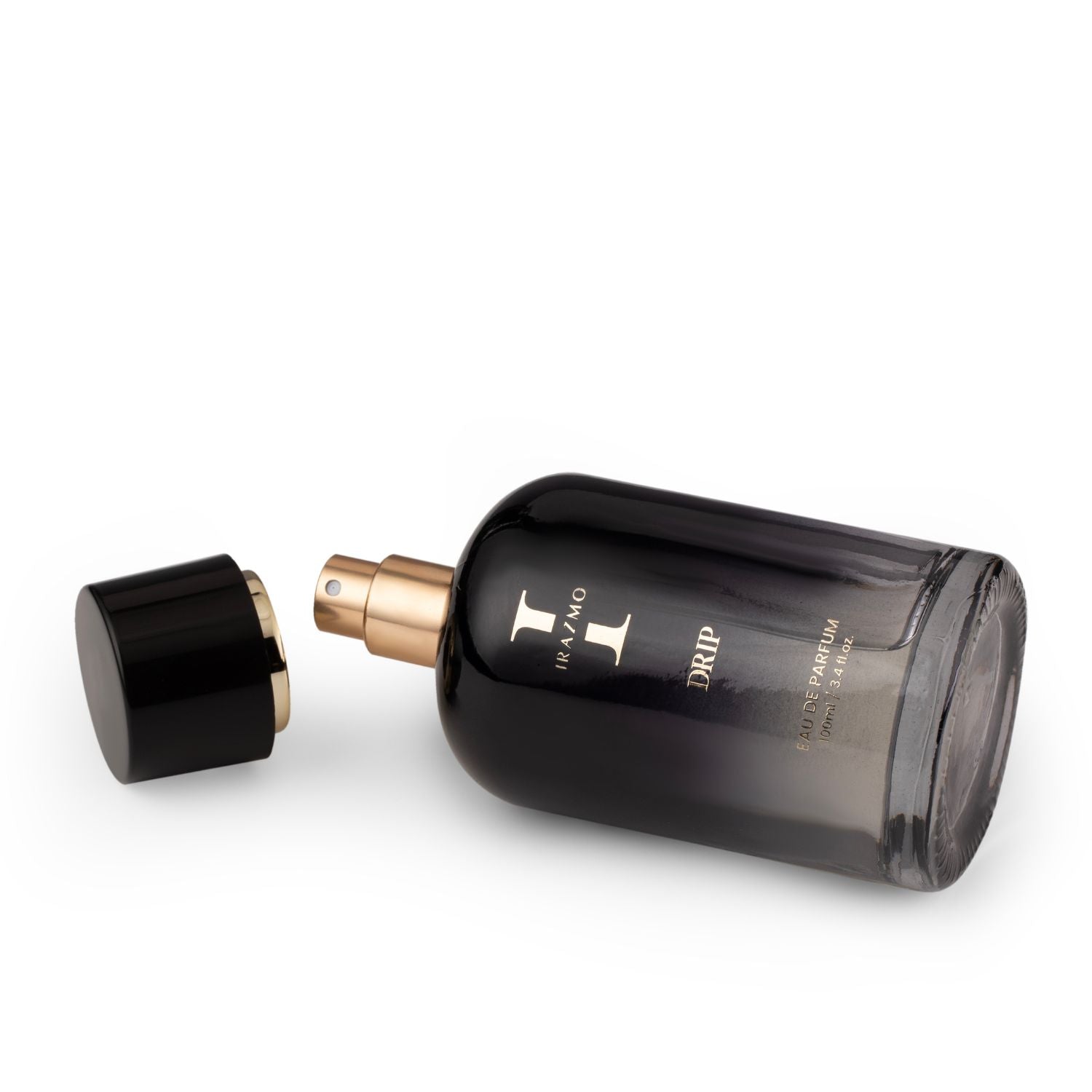 Black perfume bottle with gold cap on a white background