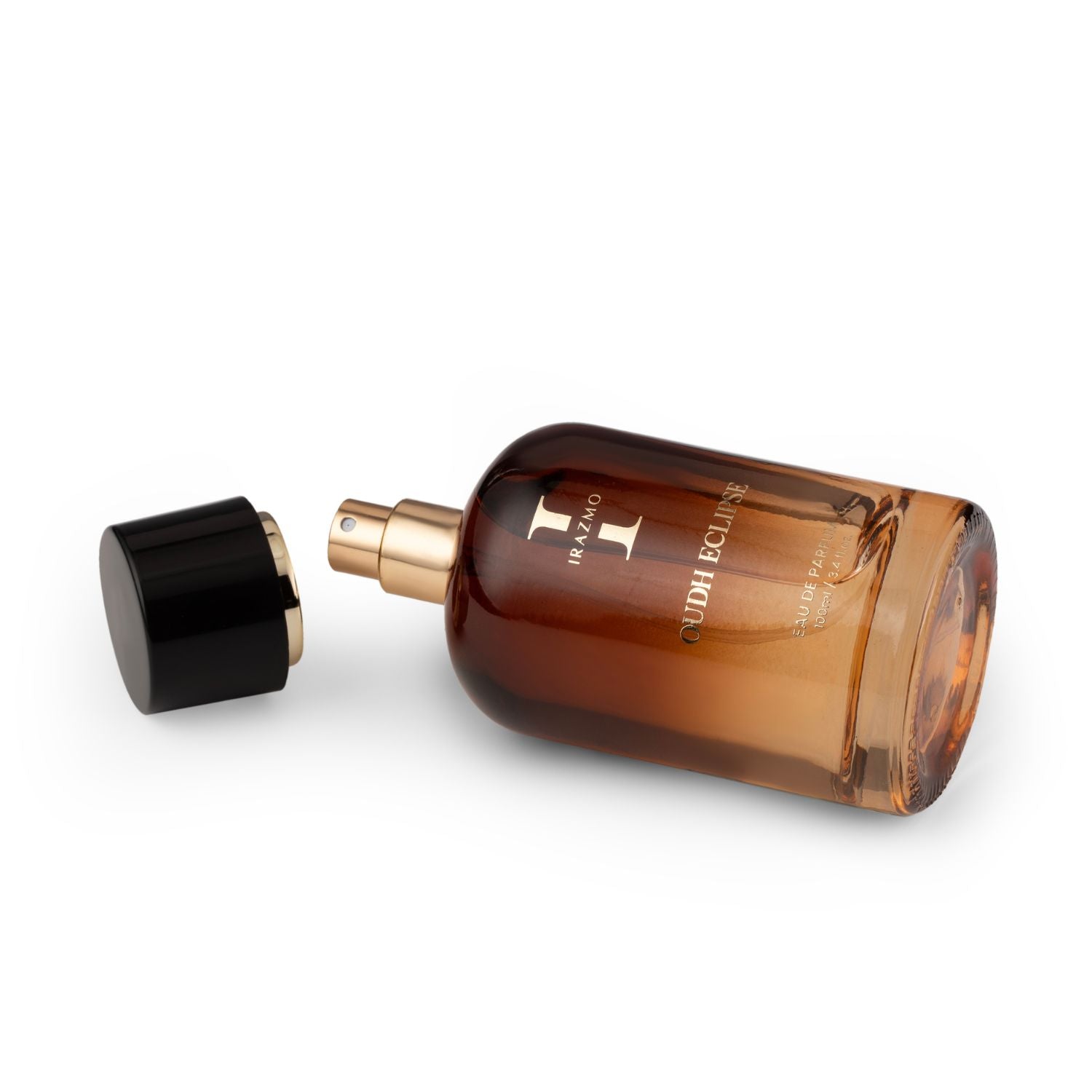 Brown perfume bottle with black cap on a white background