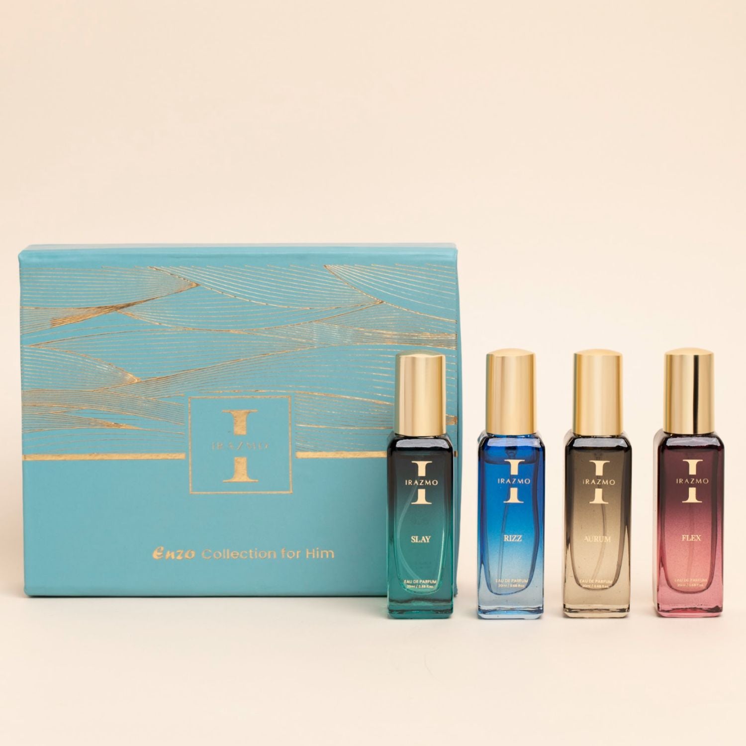 Set of four perfume bottles with a decorative box on a beige background