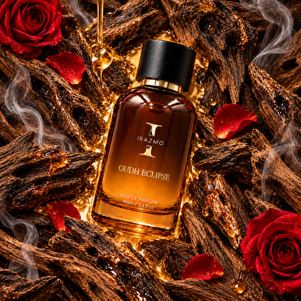Irazmo Oudh Eclipse bottle among smoky wood, red roses and rose petals