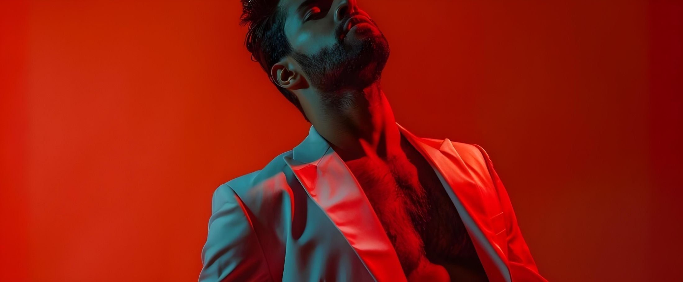 Person wearing a red suit against a red background