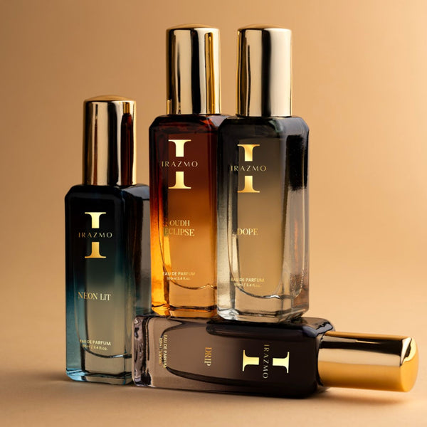 Collection of Irazmo perfume bottles on a beige background