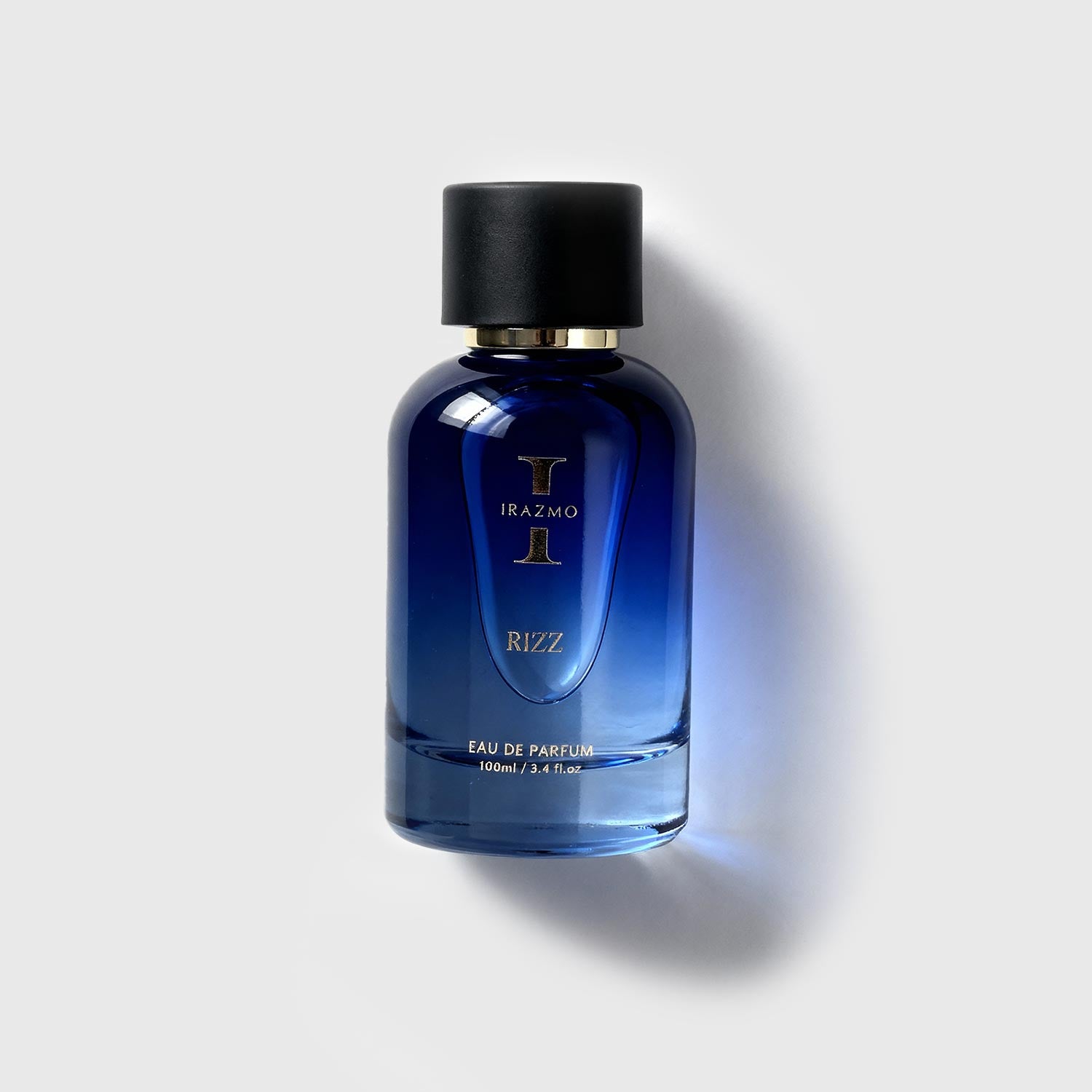 Blue perfume bottle with black cap on a light gray background