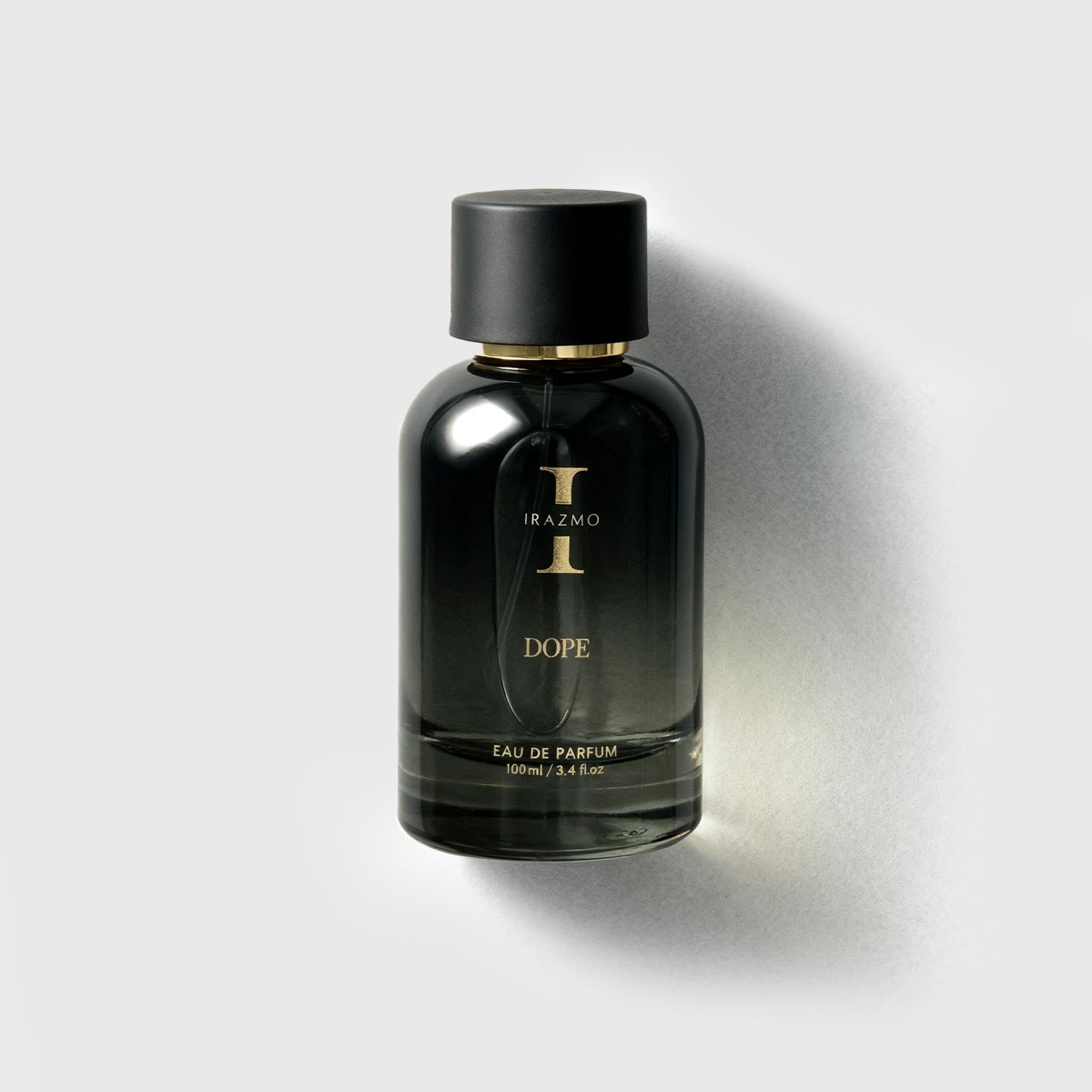 Black perfume bottle labeled 'DOPE' by Irazmo on a light gray background